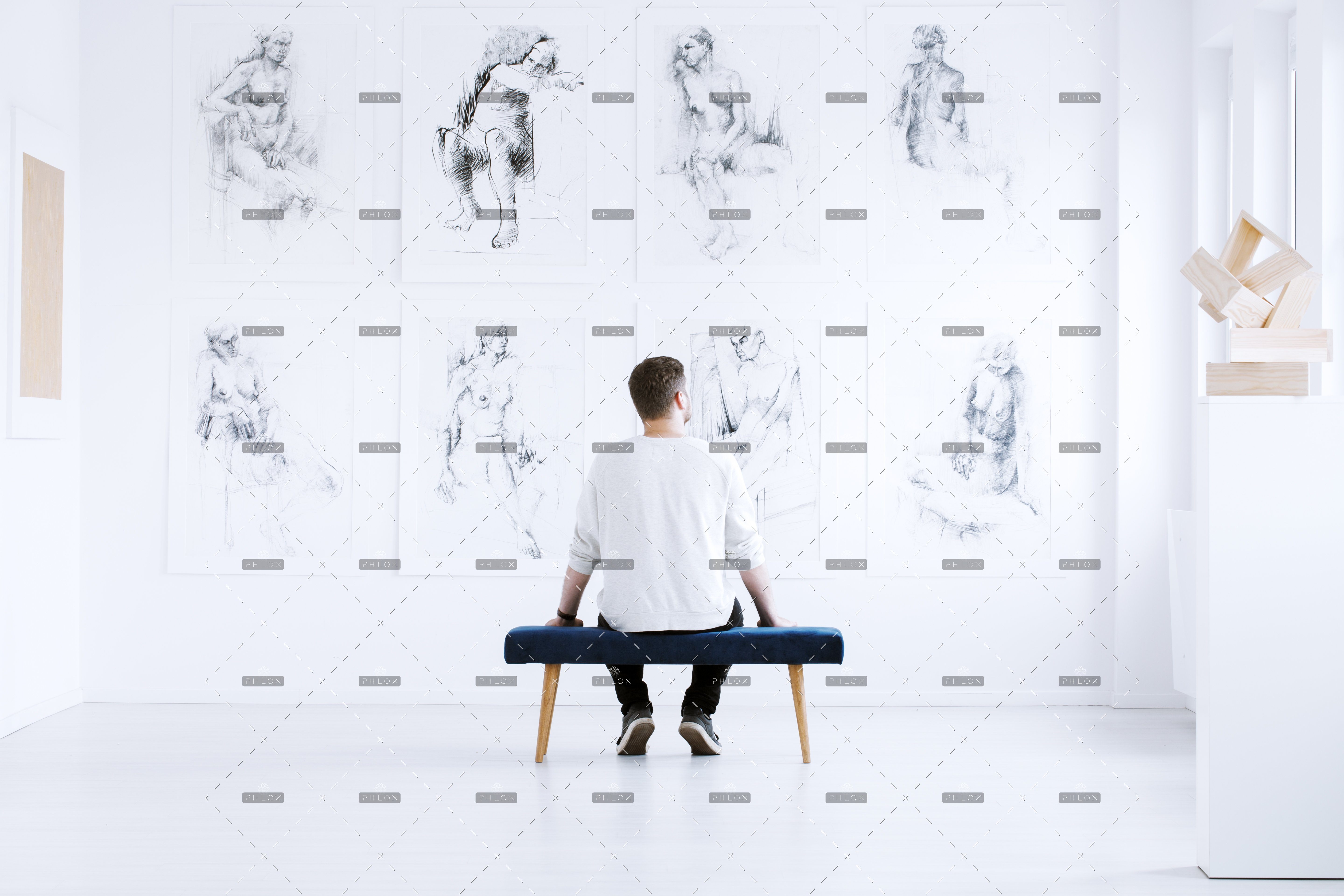 demo-attachment-218-man-relaxing-in-art-gallery-P9C4CGY-1